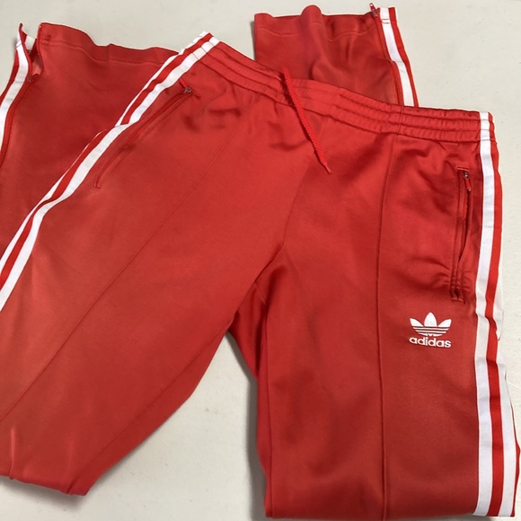 Vintage Adidas Track Pants women's size Small
Zip Leg Elastic drawstring waist - Picture 1 of 13